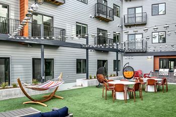 Outdoor courtyard at The Mill Apartments in Benson, NE